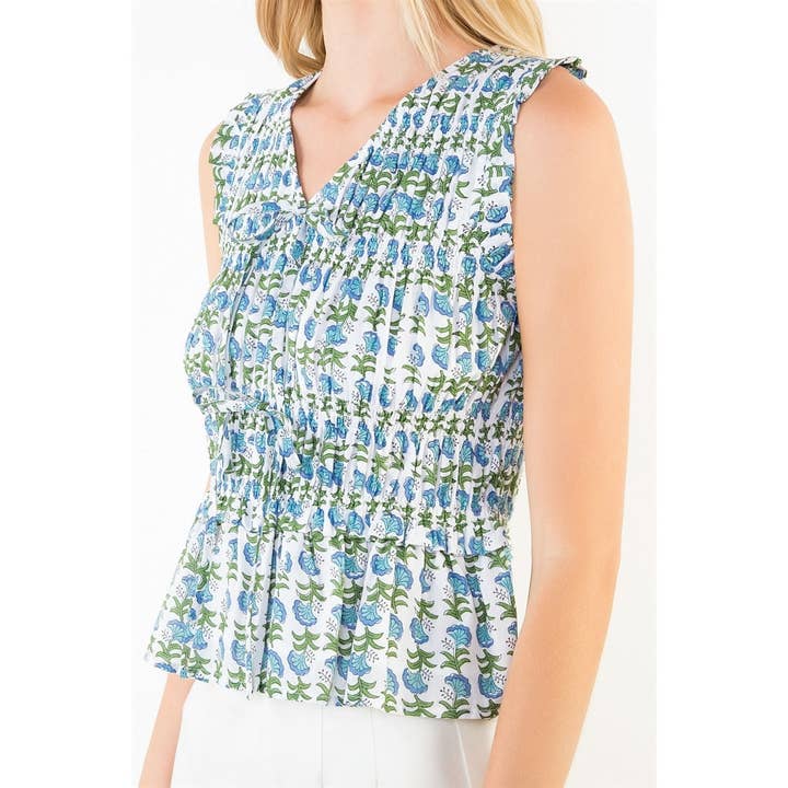 SLEEVELESS SMOCKED FLORAL RUFFLE TOP